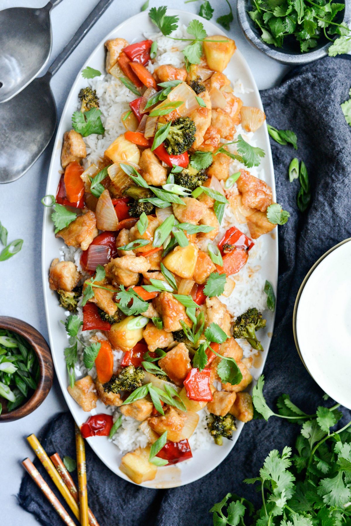 Large platter of Homemade Sweet and Sour Chicken served over rice.