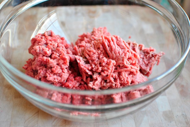 Griddled Steak Burgers with Jarlsberg + Sautéed Onions into a bowl