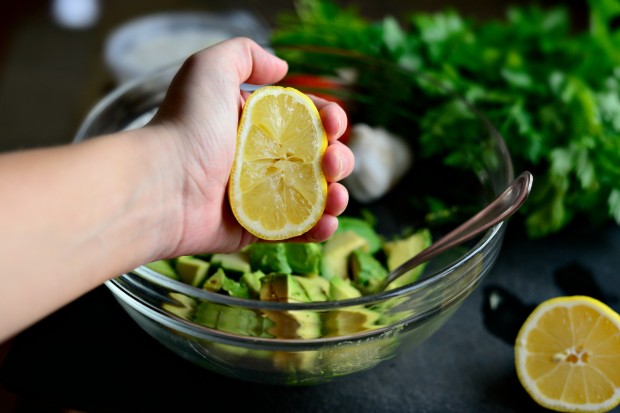 Avocado + Feta Guacamole www.SimplyScratch.com half a lemon