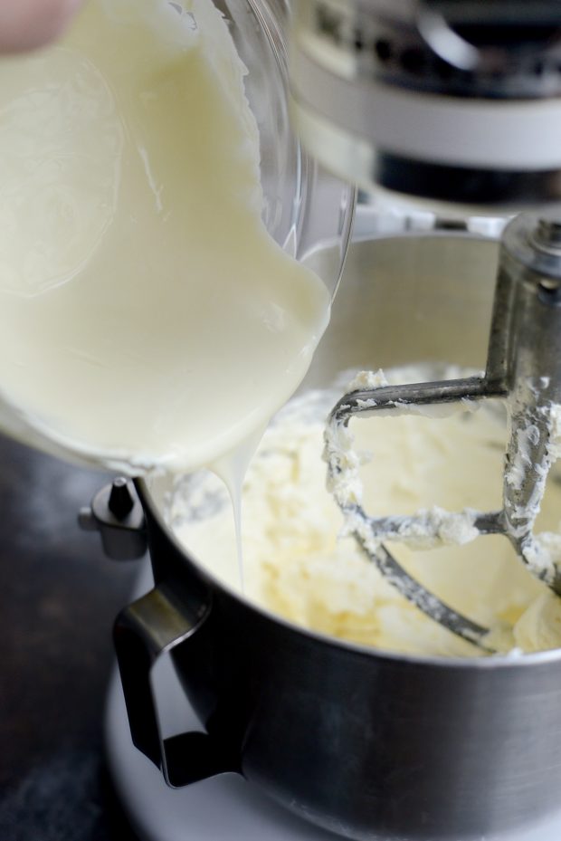 combine butter and cream cheese until smooth. With mixer on low, pour in melted white chocolate.