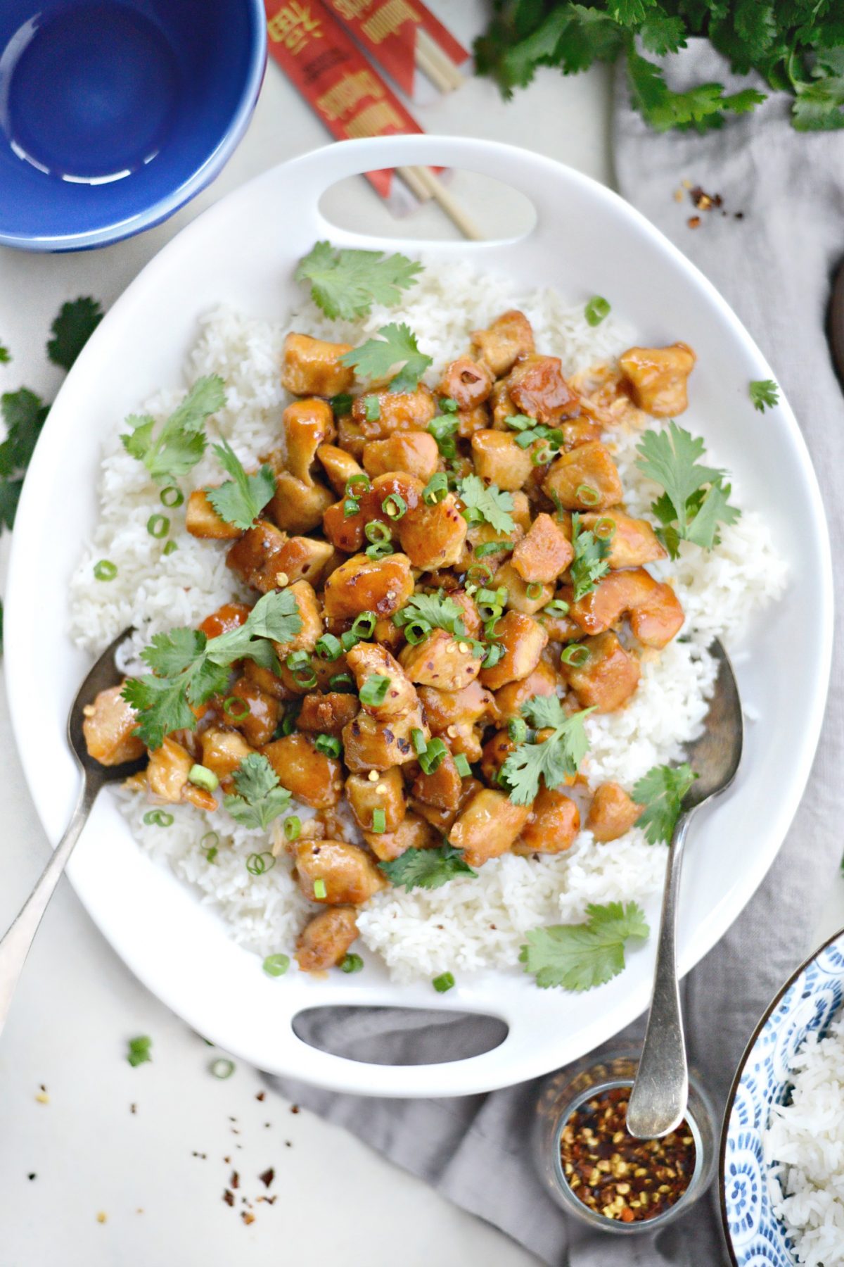 Top down shot of firecracker chicken in white bowl