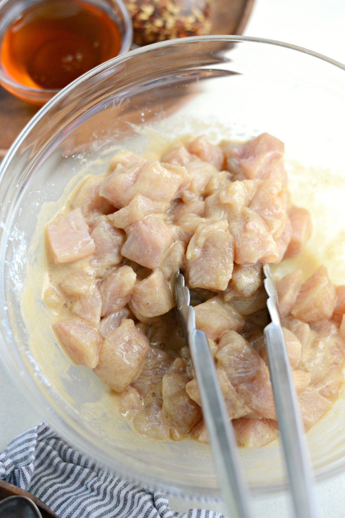 raw chicken tossed in egg white mixture