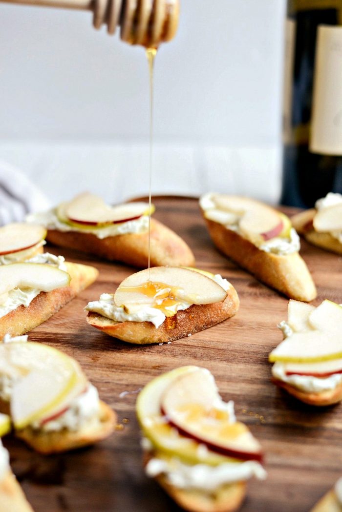 Whipped Blue Cheese Crostini with Pears and Honey l SimplyScratch.com #holiday #appetizer #pear #bluecheese #crostini #walnuts #honey