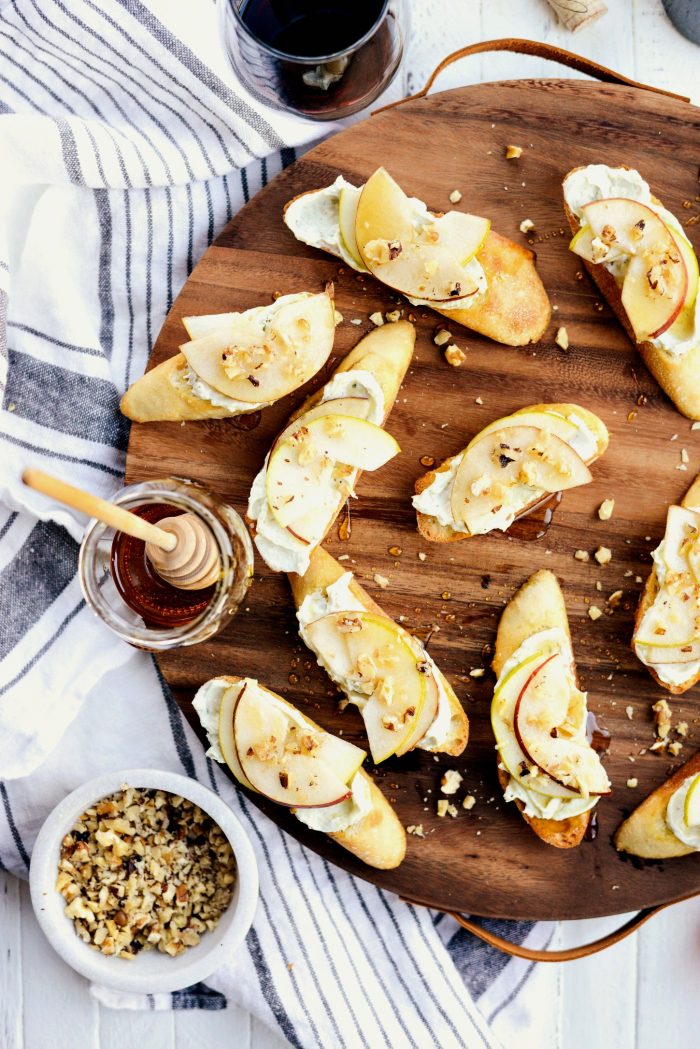 Whipped Blue Cheese Crostini with Pears and Honey l SimplyScratch.com #holiday #appetizer #pear #bluecheese #crostini #walnuts #honey