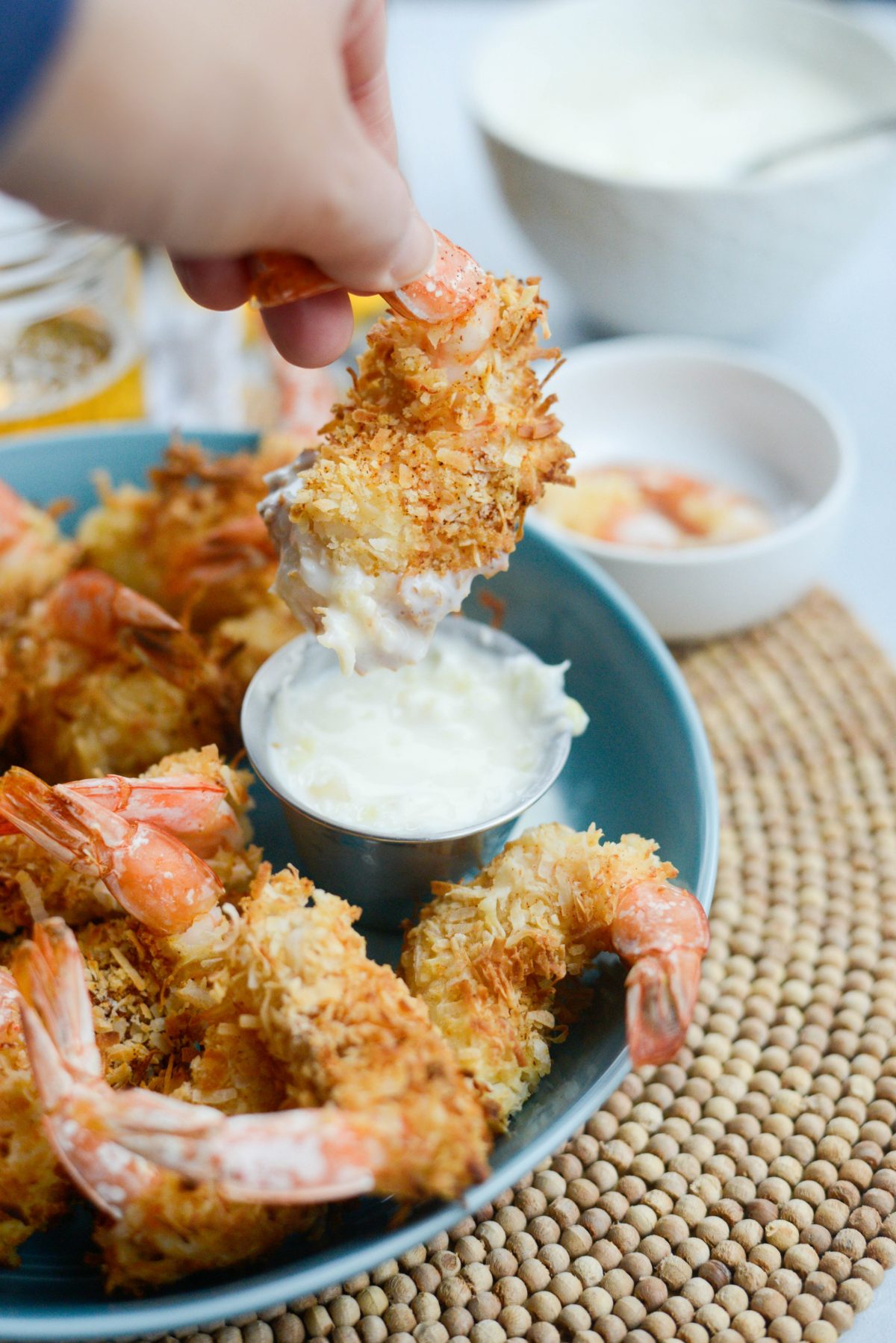 Air-Fryer Coconut Shrimp just dipped into Pineapple Coconut Yogurt Dip