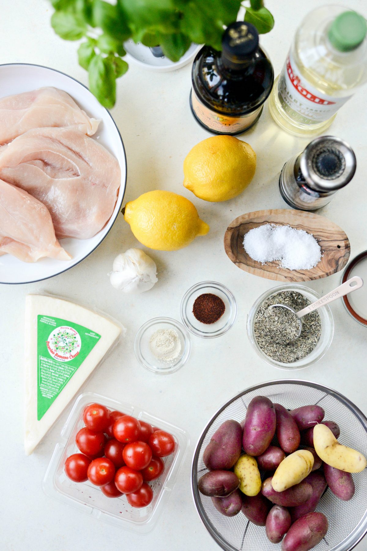 ingredients for Tuscan Chicken and Potato Sheet Pan Dinner with Balsamic Burst Tomatoes 