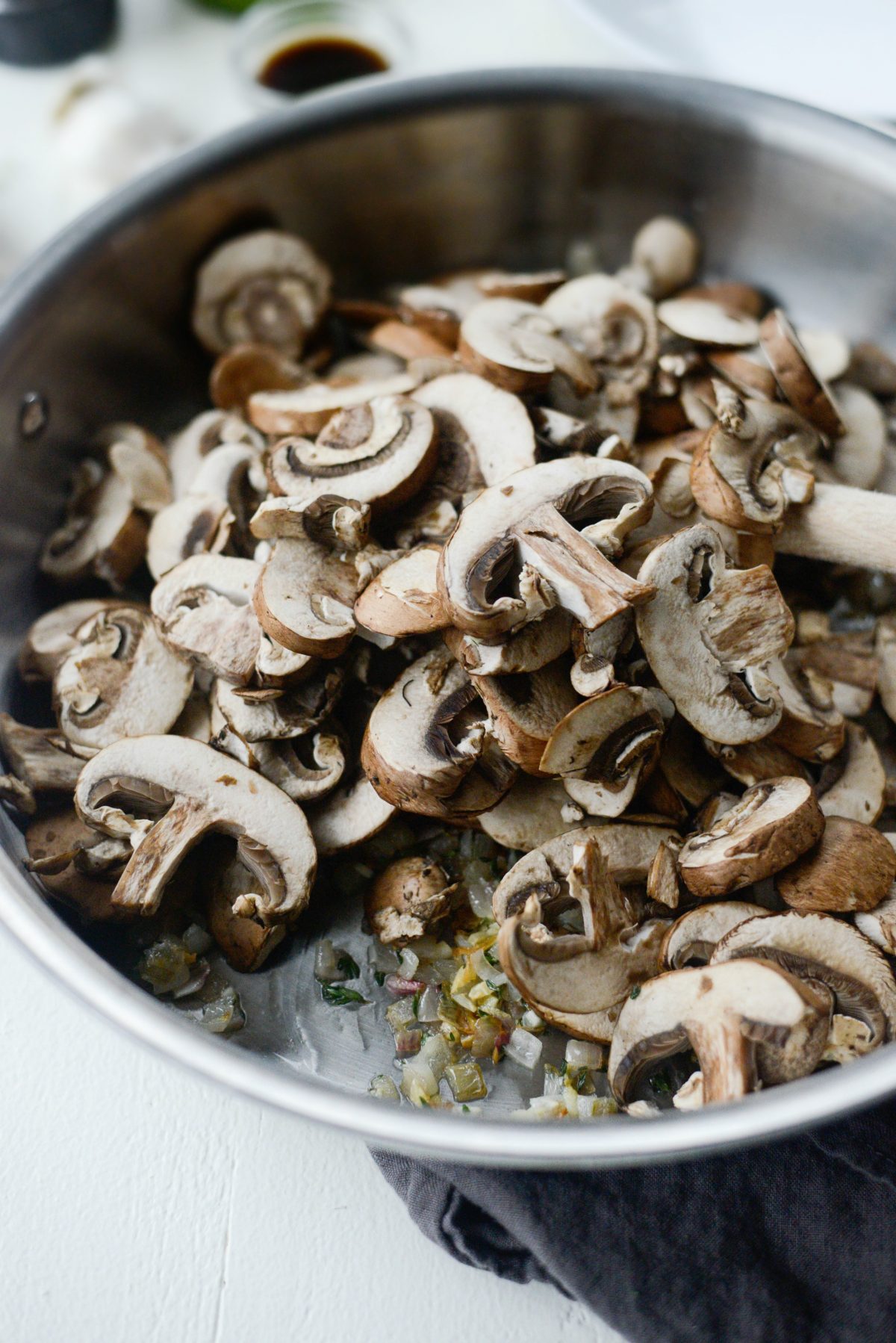 mushrooms added to pan with garlic and shallots