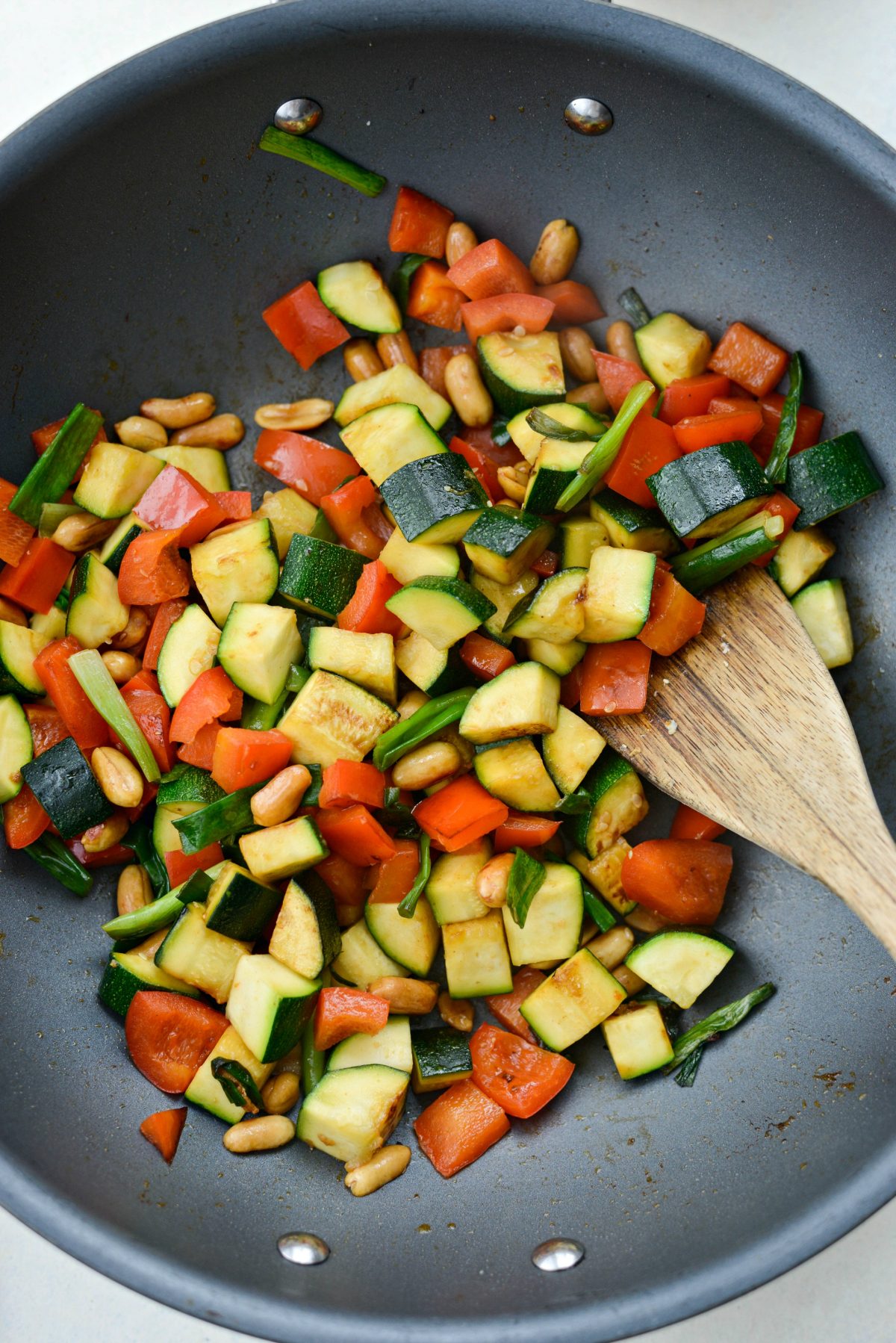 cooked vegetables in wok