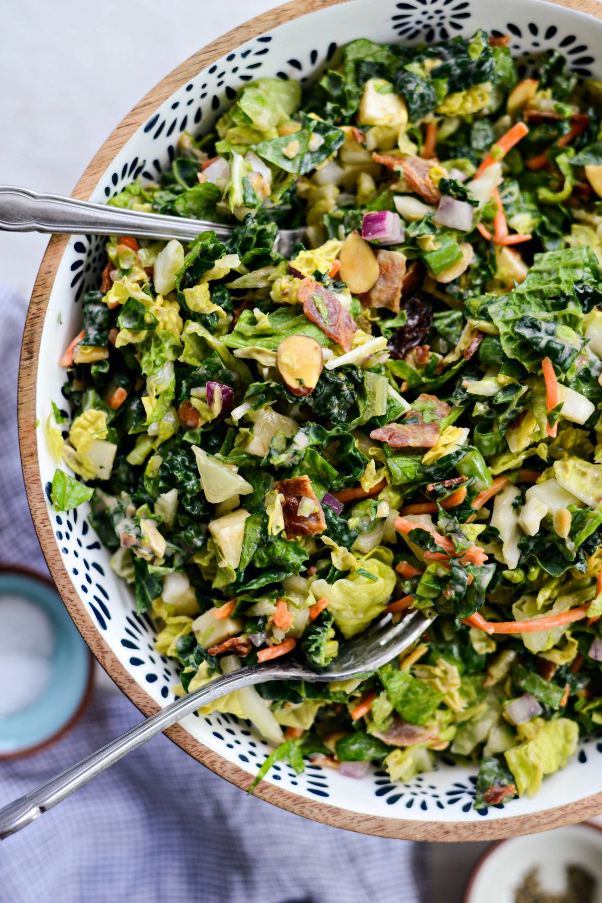 BBQ Ranch Chopped Salad in white and blue speckled bowl.