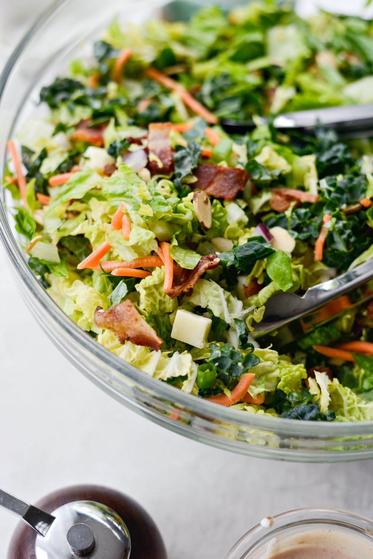 toss salad ingredients together in bowl.