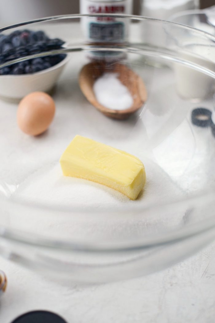 add butter and sugar to large bowl.