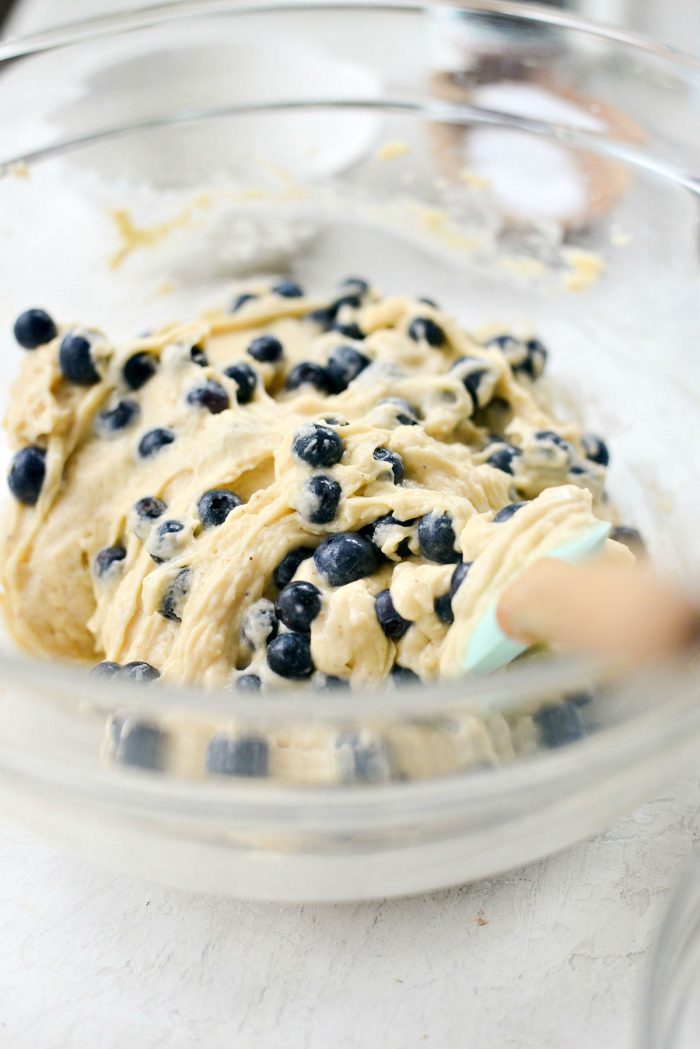 gently fold blueberries into batter