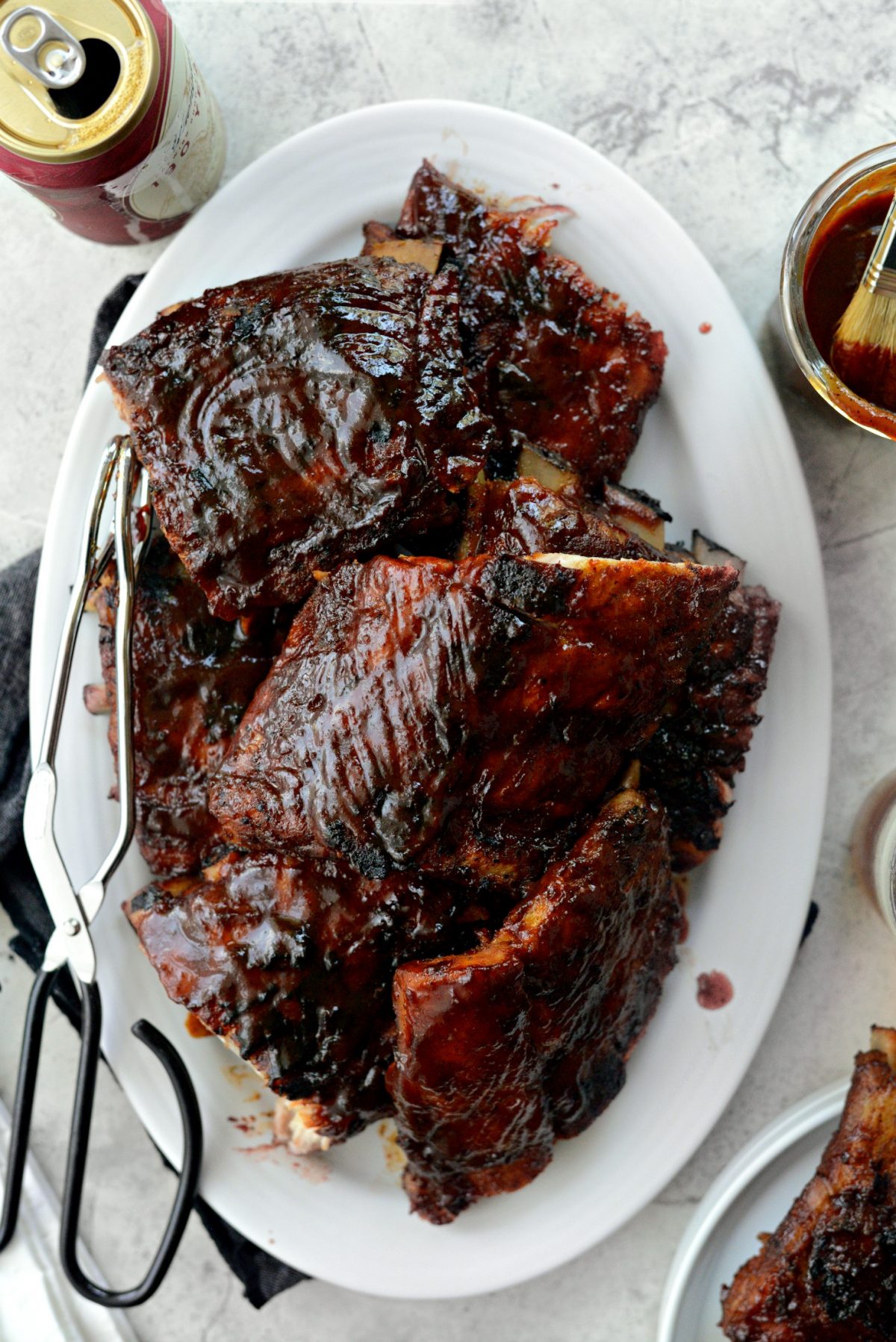 Easy BBQ Baby Back Ribs l SimplyScratch.com #easyrecipe #griling #BBQ #babybackribs #ribs #ovenbaked #grilled #homemade #sauce 