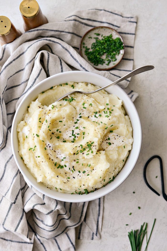 Buttermilk Cauliflower Mashed Potatoes l SimplyScratch.com #cauliflower #mashedpotatoes #potatoes #light #buttermilk #sidedish #homemade #fromscratch #easy