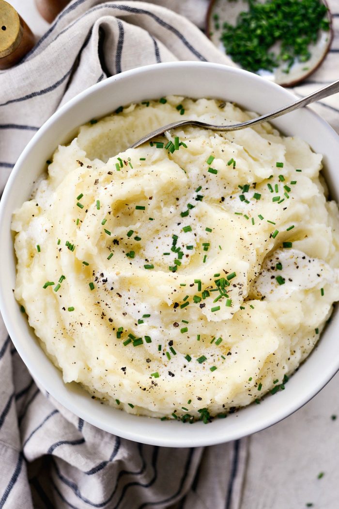 Buttermilk Cauliflower Mashed Potatoes l SimplyScratch.com #cauliflower #mashedpotatoes #potatoes #light #buttermilk #sidedish #homemade #fromscratch #easy