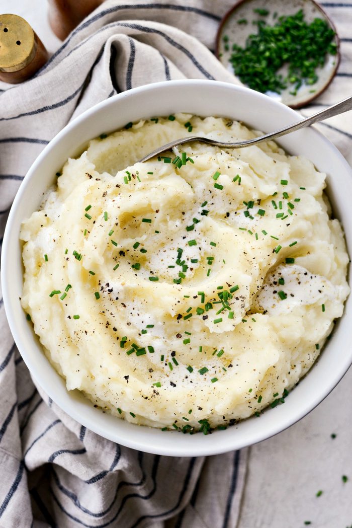 Buttermilk Cauliflower Mashed Potatoes l SimplyScratch.com #cauliflower #mashedpotatoes #potatoes #light #buttermilk #sidedish #homemade #fromscratch #easy
