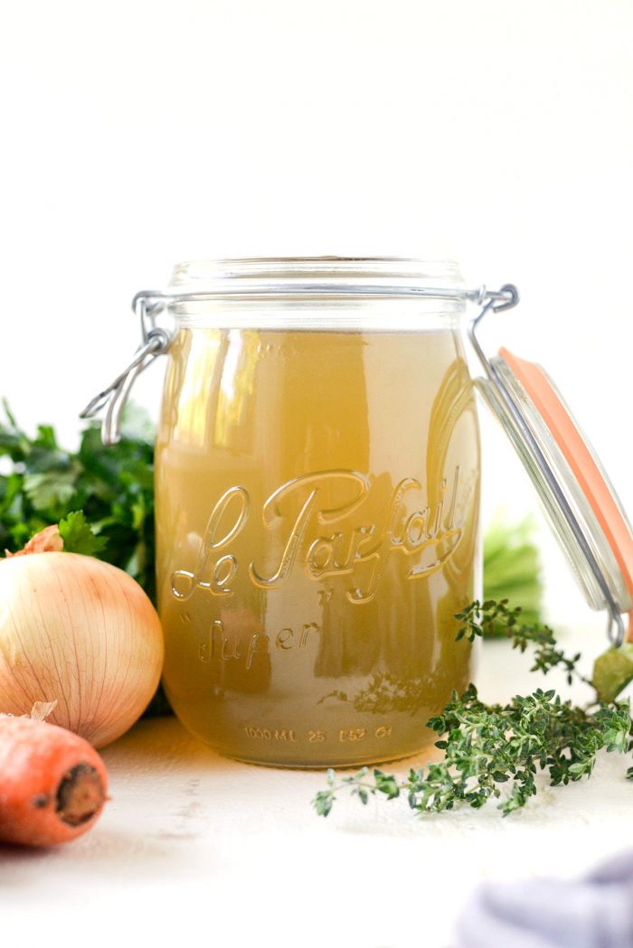 Slow Cooker Chicken Stock l SimplyScratch.com #homemade #fromscratch #slowcooker #chickenstock #chicken #simplyscratch