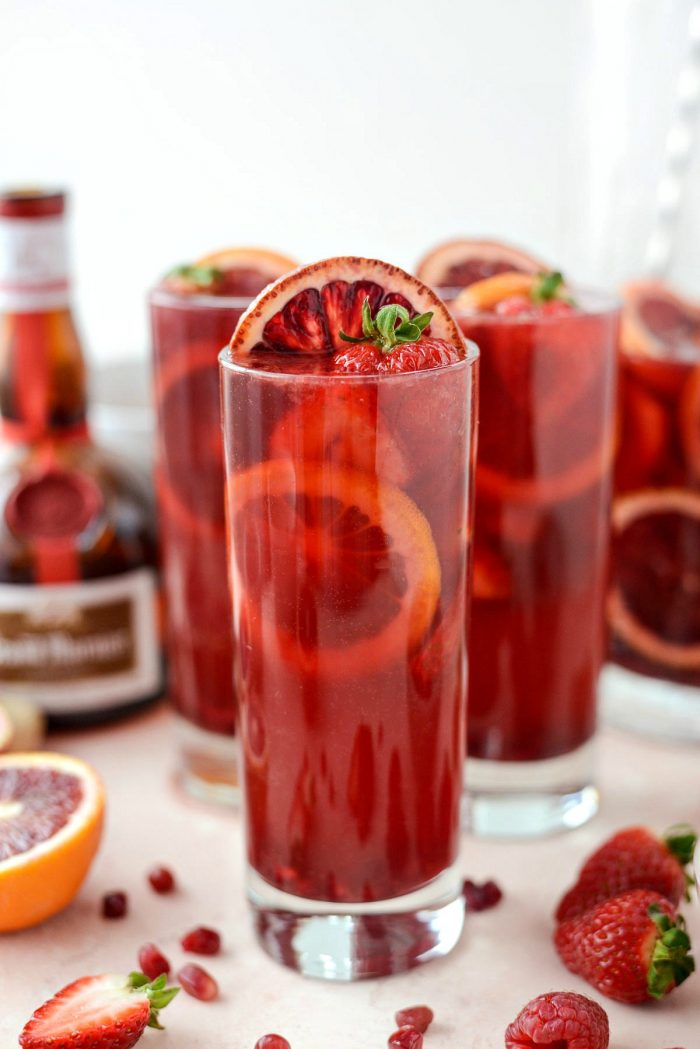 Champagne Sangria l SimplyScratch.com #champagne #sangria #valentinesday #adultbeverage #drink #alcholic #strawberry #pomegranate #raspberry