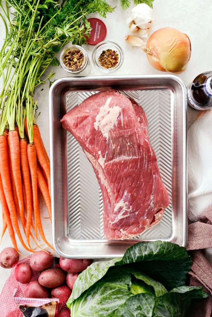 Slow Cooker Corned Beef and Cabbage Dinner l SimplyScratch.com #slowcooker #cornedbeef #stpatricksday #easydinner #crockpot #slowcooking #beef #boileddinner #irishdinner 