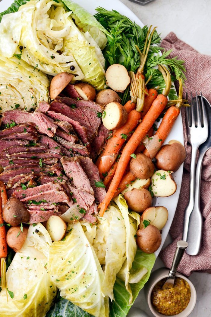 Slow Cooker Corned Beef and Cabbage Dinner l SimplyScratch.com #slowcooker #cornedbeef #stpatricksday #easydinner #crockpot #slowcooking #beef #boileddinner #irishdinner 