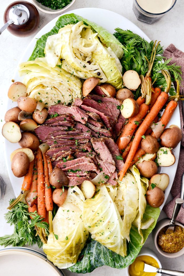 Slow Cooker Corned Beef and Cabbage Dinner l SimplyScratch.com #slowcooker #cornedbeef #stpatricksday #easydinner #crockpot #slowcooking #beef #boileddinner #irishdinner 