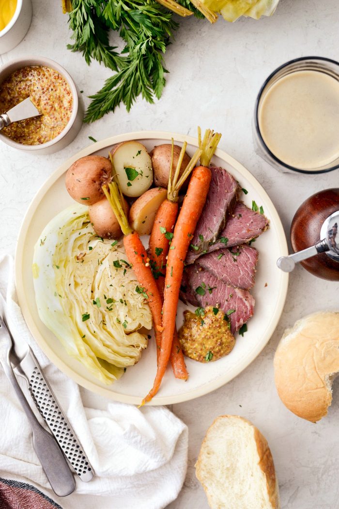 Slow Cooker Corned Beef and Cabbage Dinner l SimplyScratch.com #slowcooker #cornedbeef #stpatricksday #easydinner #crockpot #slowcooking #beef #boileddinner #irishdinner 