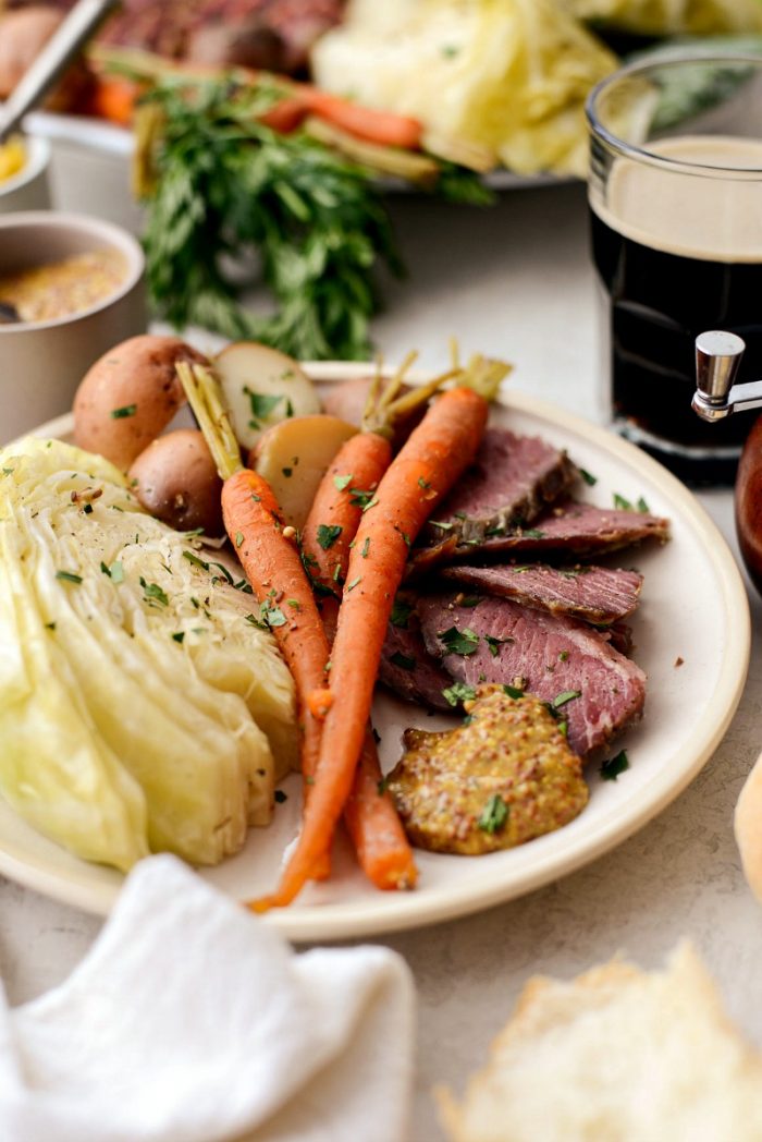 Slow Cooker Corned Beef and Cabbage Dinner l SimplyScratch.com #slowcooker #cornedbeef #stpatricksday #easydinner #crockpot #slowcooking #beef #boileddinner #irishdinner 