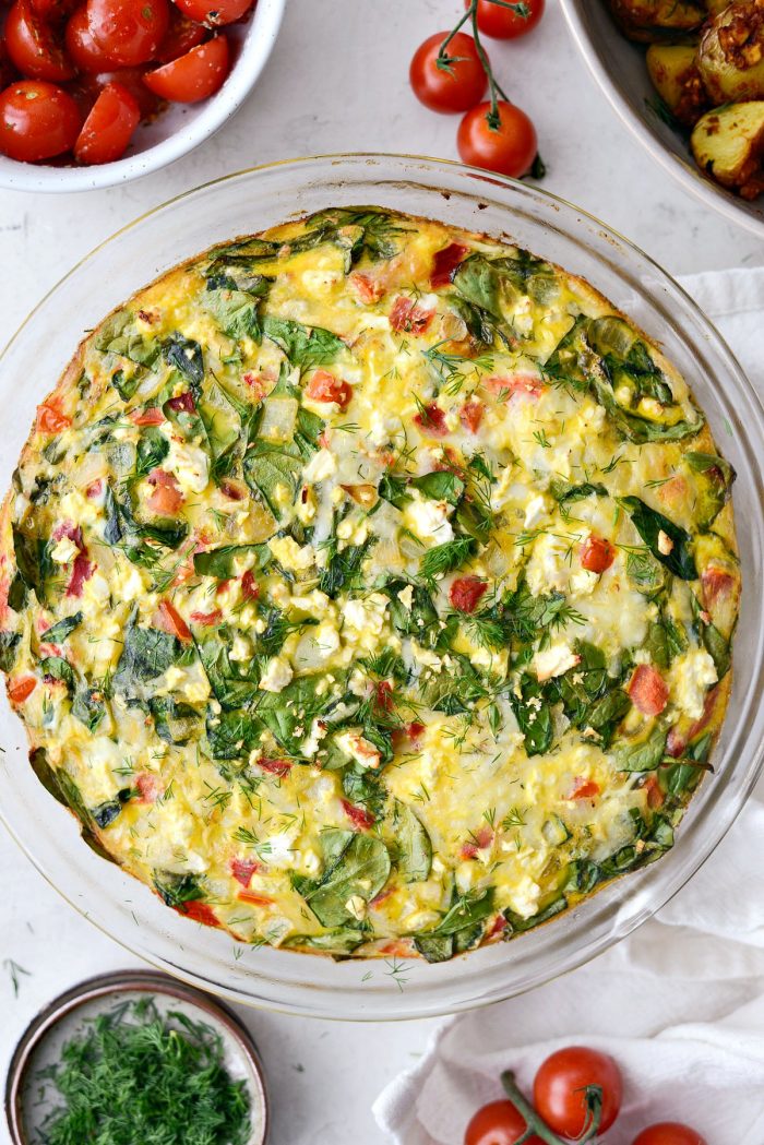 Tomato Spinach and Feta Crustless Quiche l SimplyScratch.com #breakfast #brunch #tomato #feta #spinach #quiche #eggs #lowcarb #weightwatchers