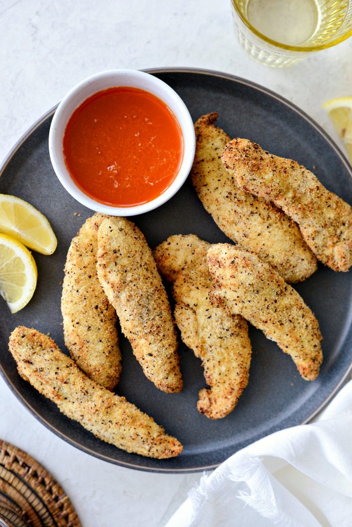 Air Fryer Lemon Pepper Chicken Tenders l SimplyScratch.com #homemade #airfryer #lemon #pepper #chicken #chickentenders #hothoneybutter