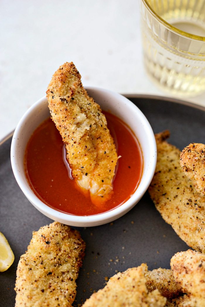 Air Fryer Lemon Pepper Chicken Tenders l SimplyScratch.com #homemade #airfryer #lemon #pepper #chicken #chickentenders #hothoneybutter