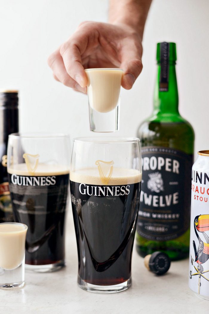 Irish Sammer shot hovering over Guinness 