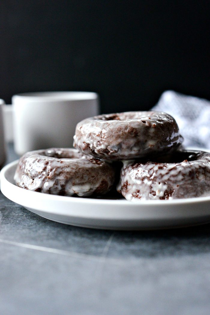 Glazed Chocolate Cake Doughnuts - stack of doughnuts