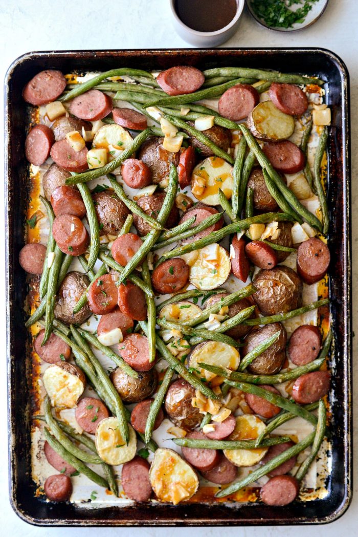 pan with roasted sausage, potatoes, green beans and onions
