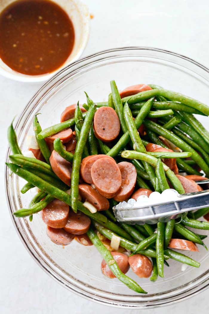 sausage, onion and green beans tossed with half the sauce.