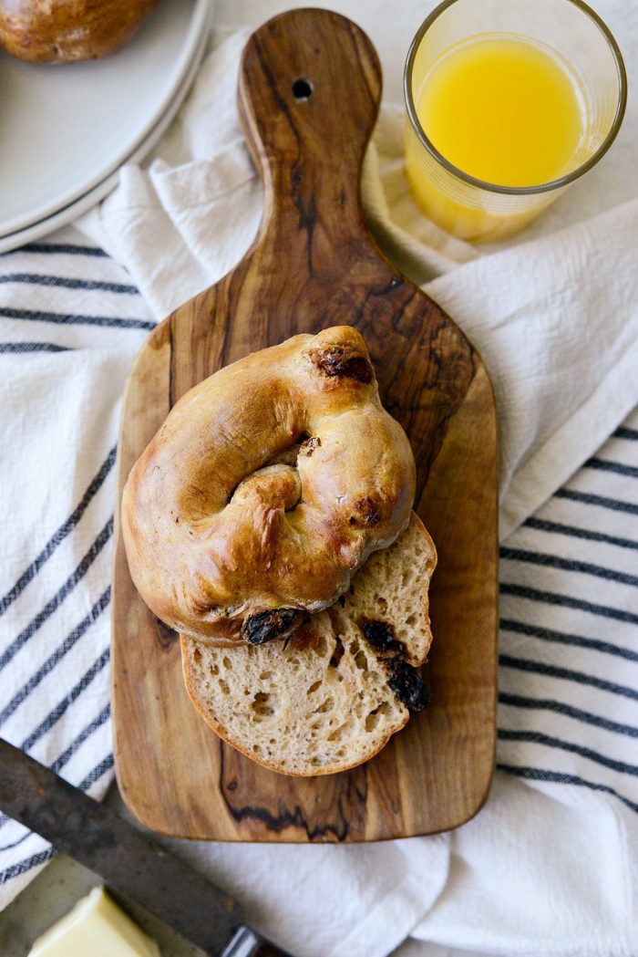 cinnamon raisin bagel sliced in half.