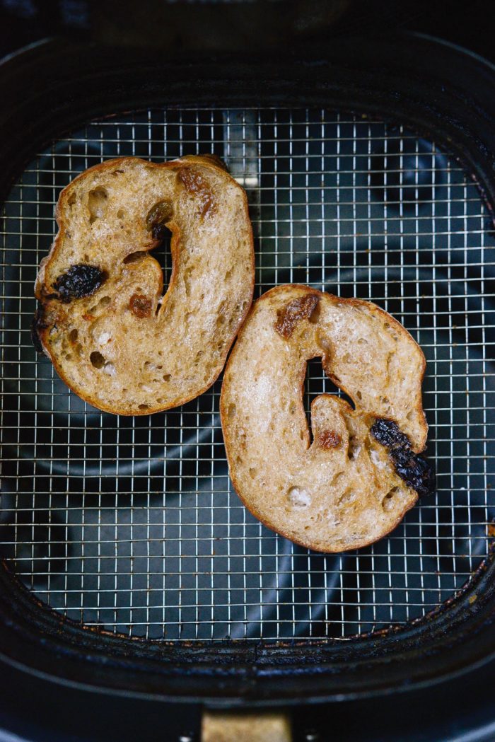 toasted air fryer cinnamon raisin bagel.