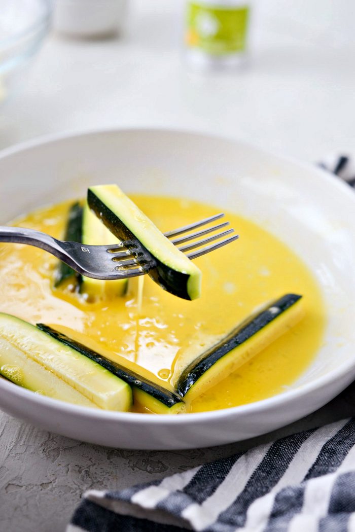 egg dripping of zucchini on fork