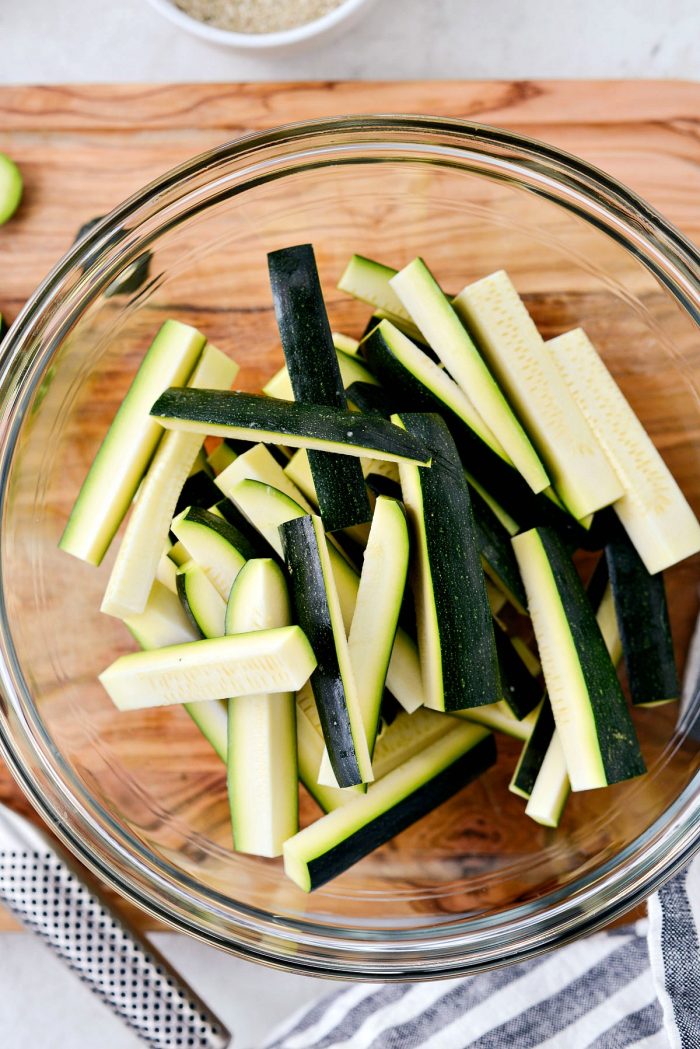 glass bowl of zucchini sticks