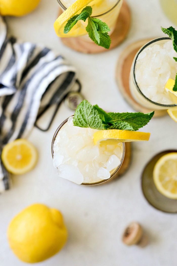 garnish lemon shandy refresher with lemon and mint