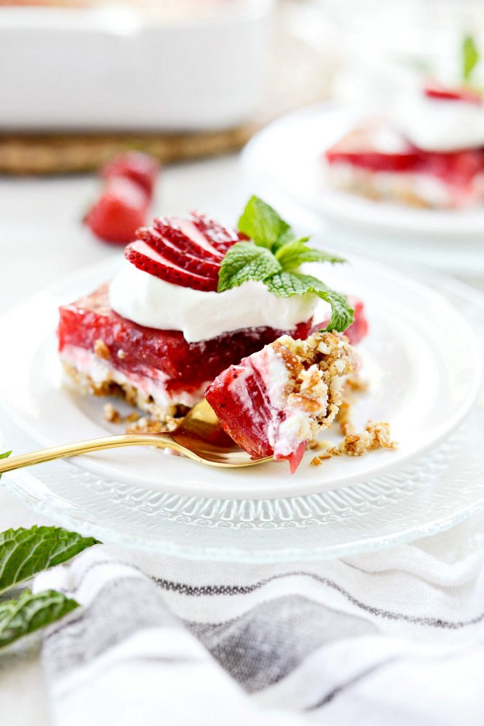 the perfect bite of strawberry pretzel dessert bar