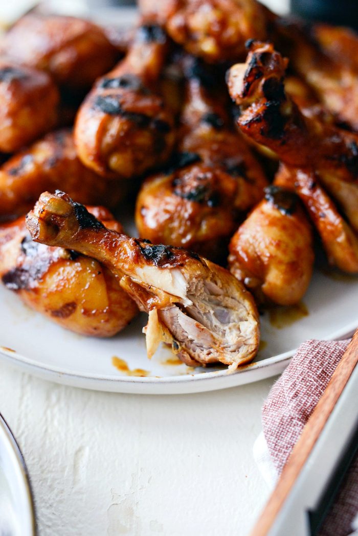 bite of easy bbq chicken drumsticks