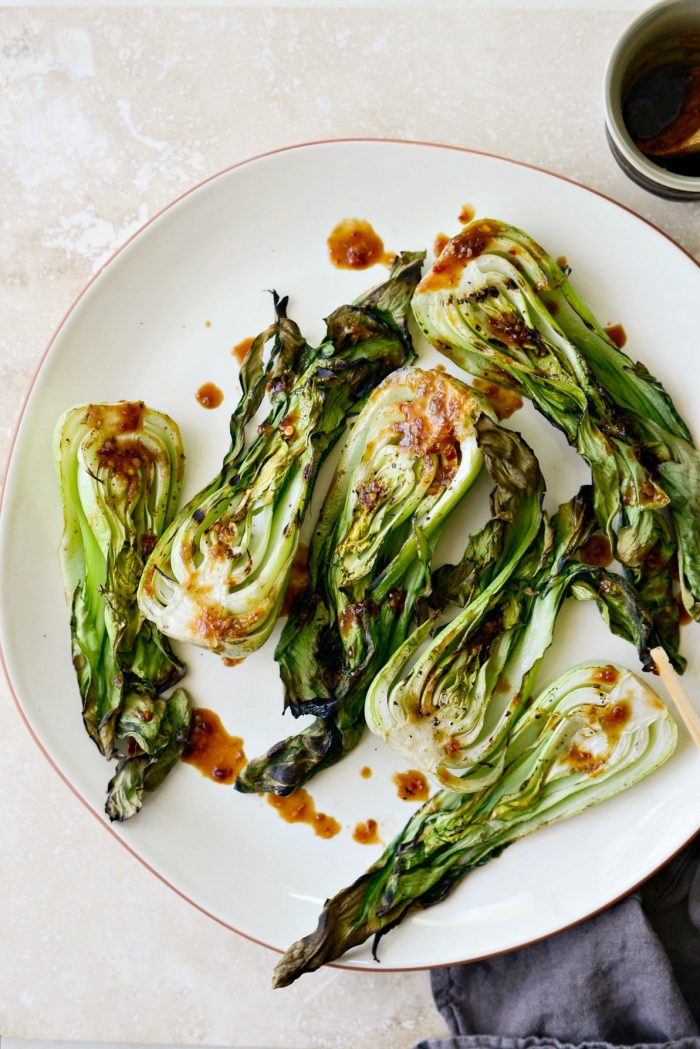 platter of grilled baby Bok Choy with ginger chia sauce