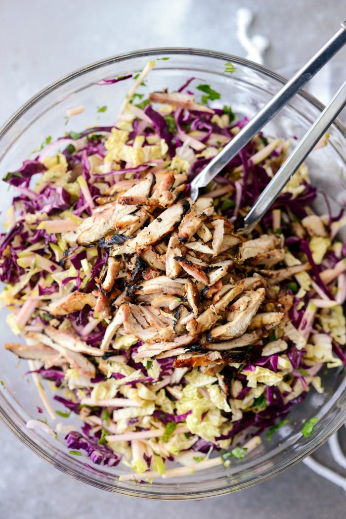 add sliced grilled chicken to salad.