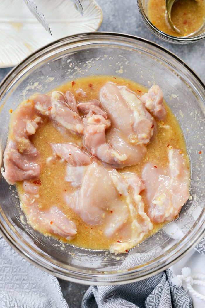 add chicken thighs to marinade.