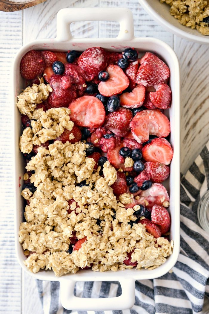 sprinkle oat topping over berries