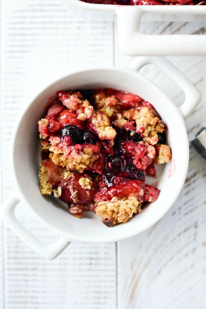 Homemade Berry Crisp Recipe in white bowl.