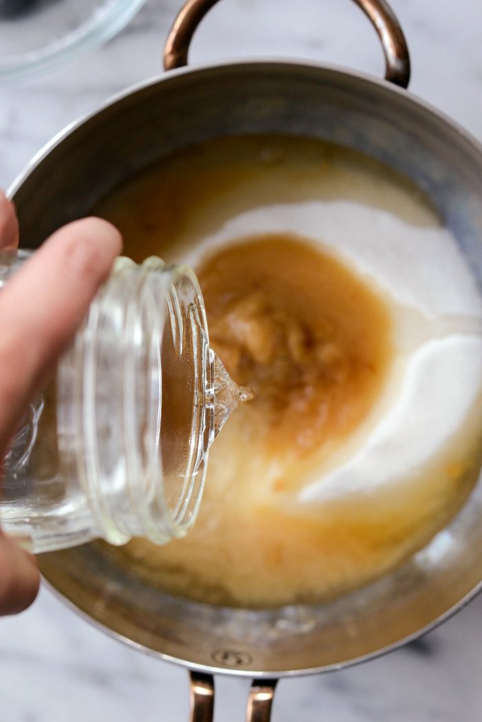 add water to sugar in sauce pan.