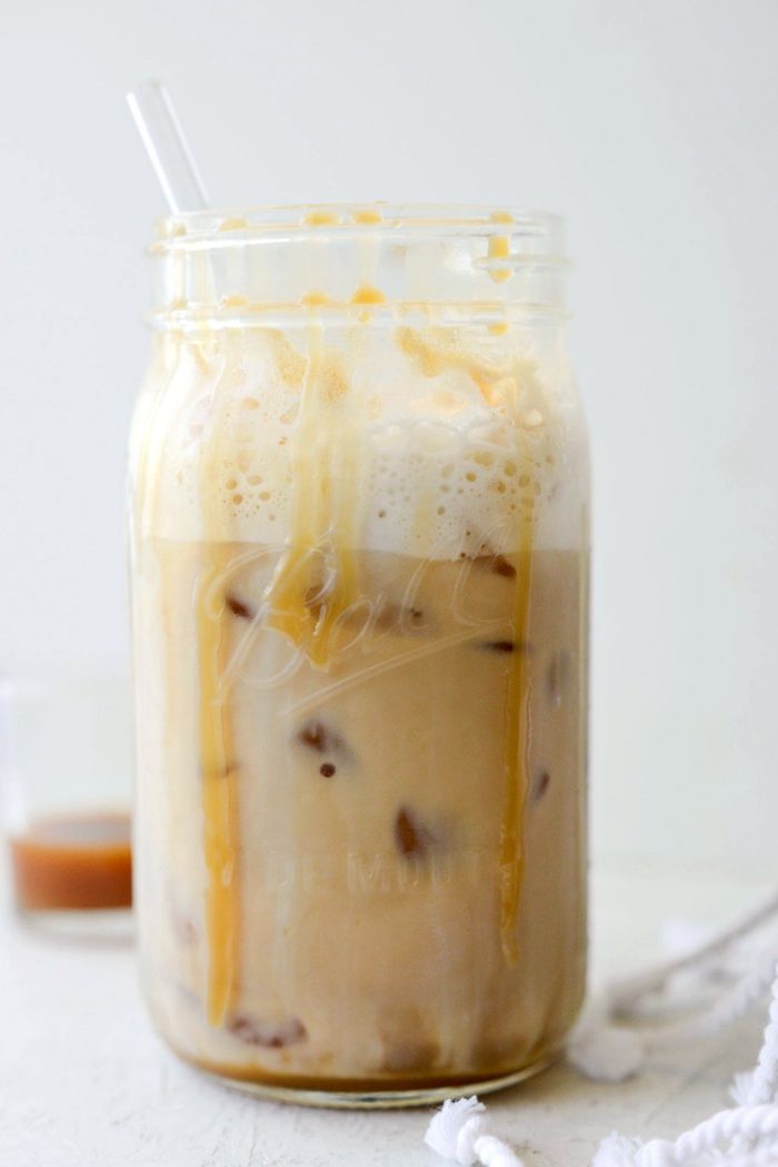 Glass jar of Iced Caramel Vanilla Latte.