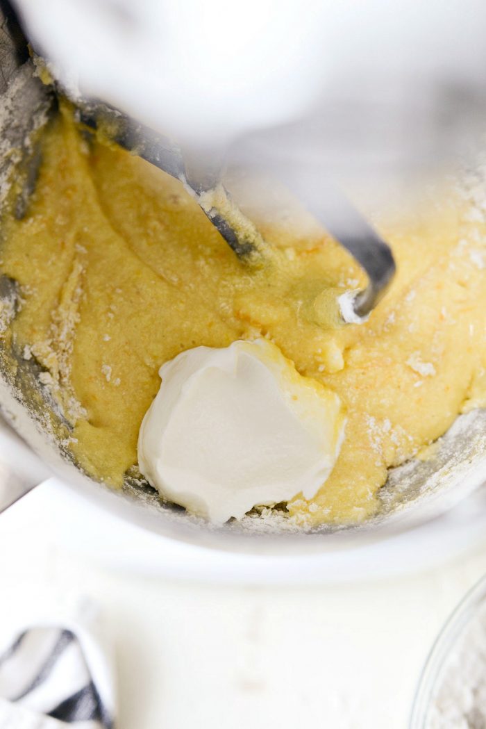 alternate dry ingredients with sour cream.
