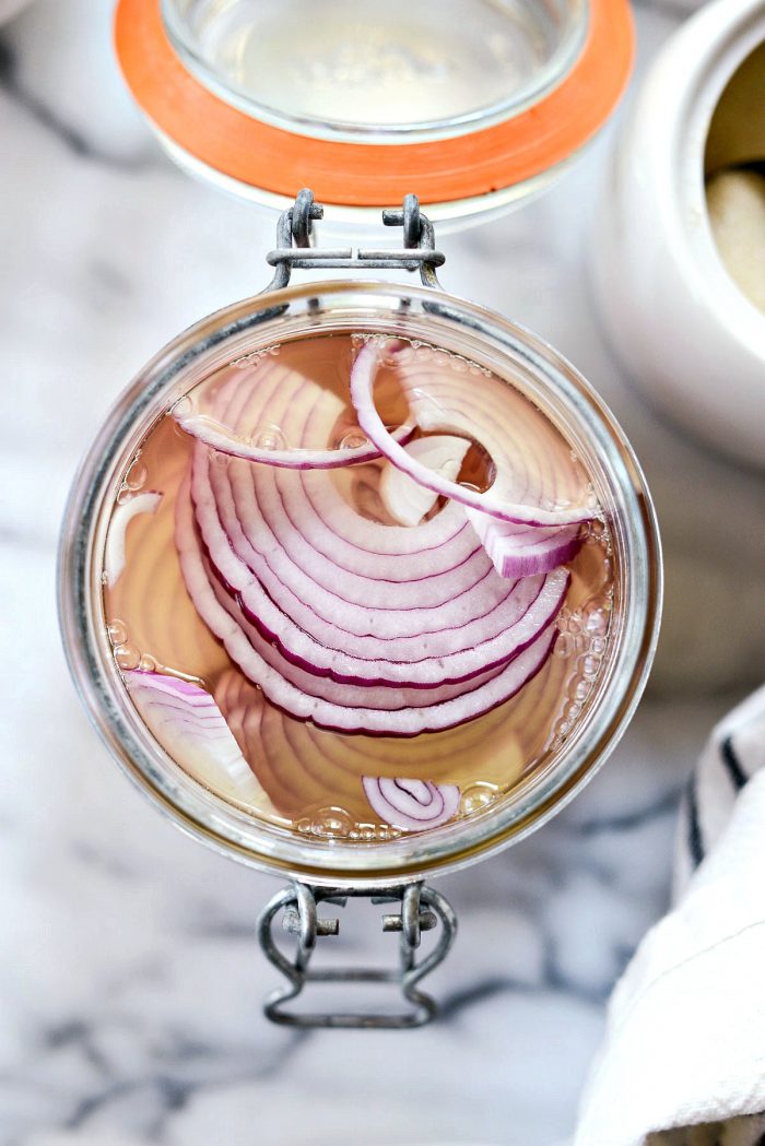 submerge the onions in the pickling liquids.